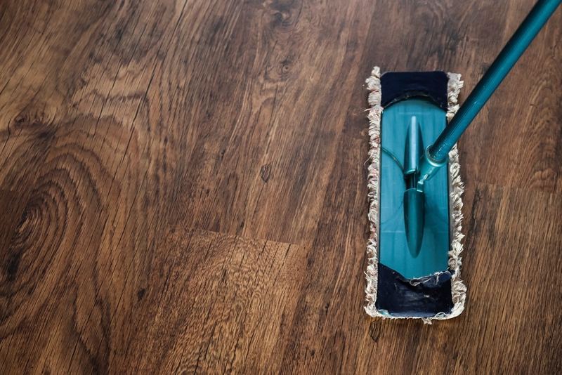 Hardwood floor being mopped